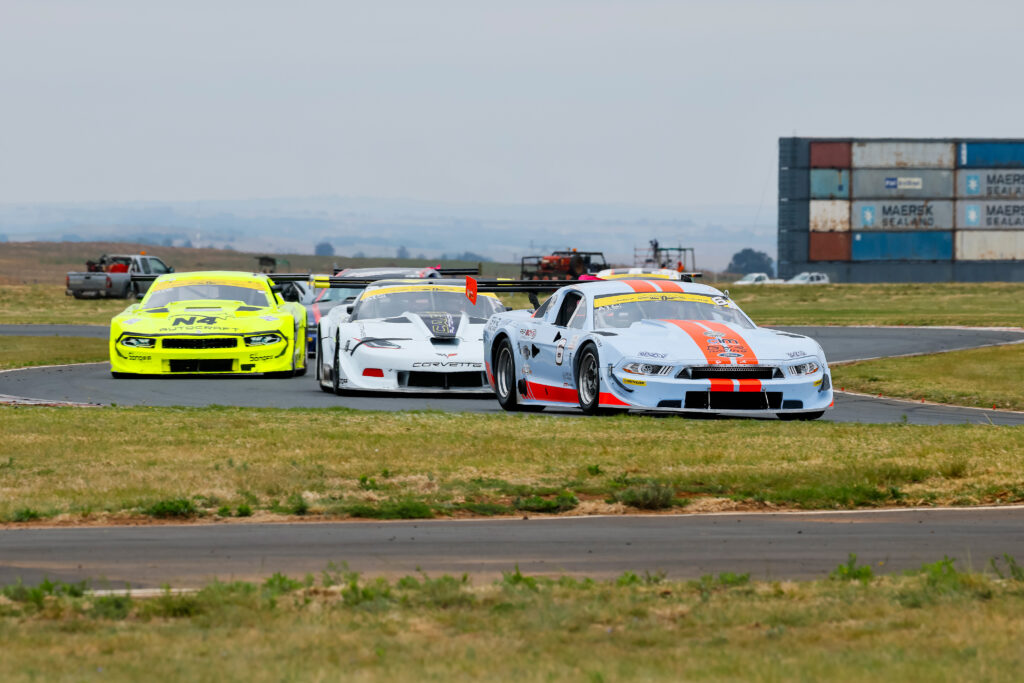 Warren Lombard leads Thomas Reib and Terry Wilford